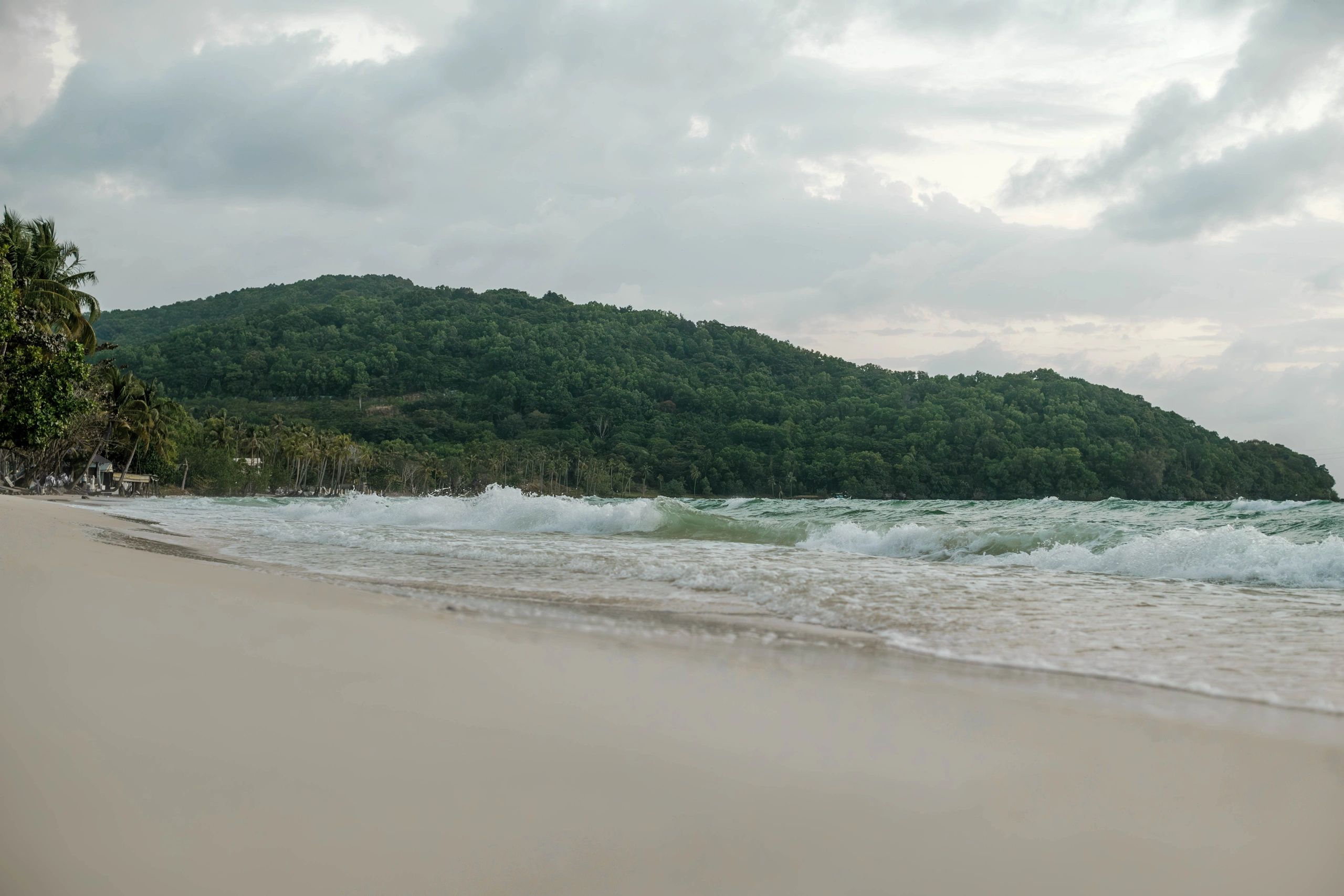 Ocean waves along a tropical shoreline